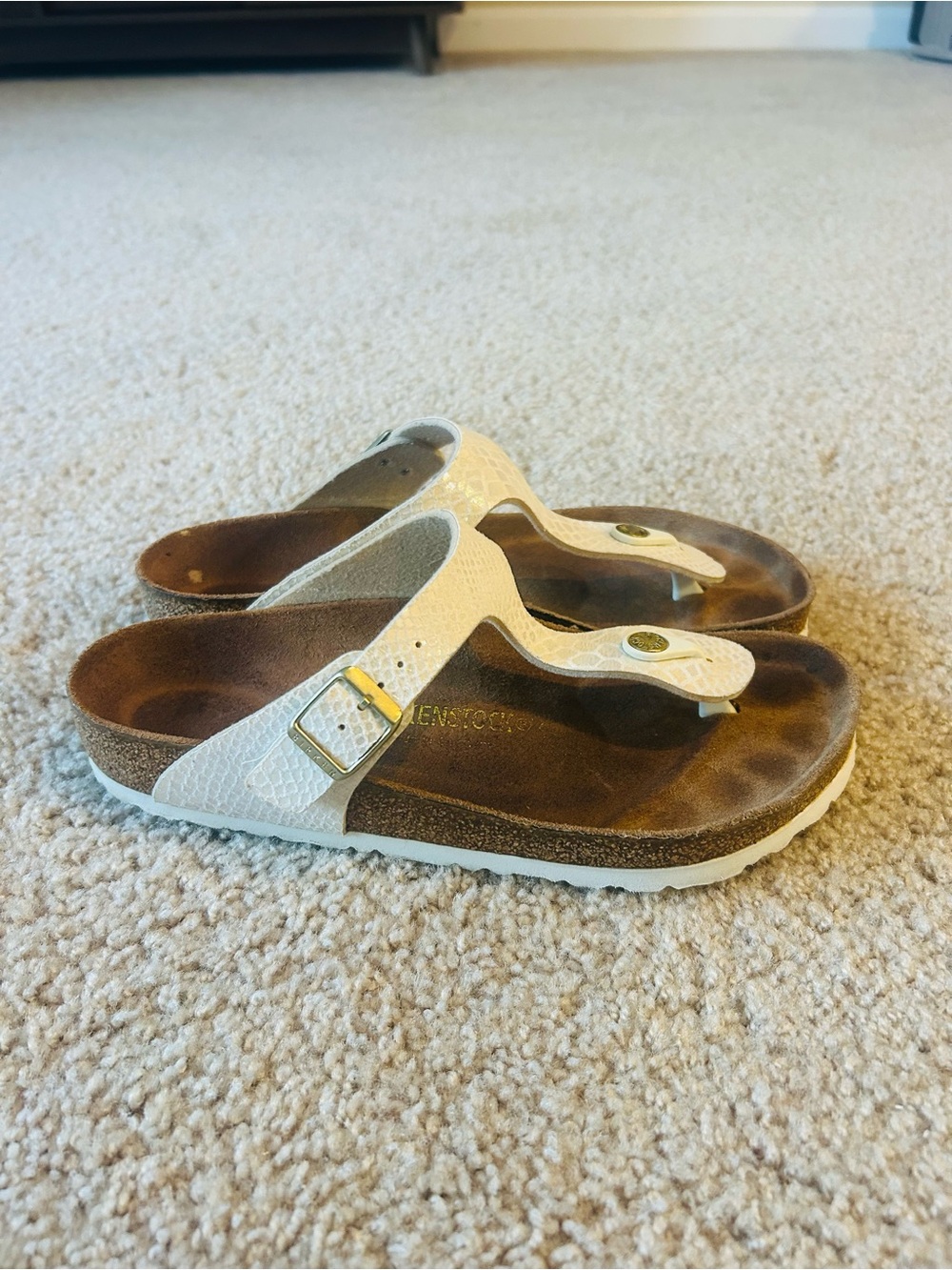 Birkenstock White Textured Thong Sandals with Gold Buckle
